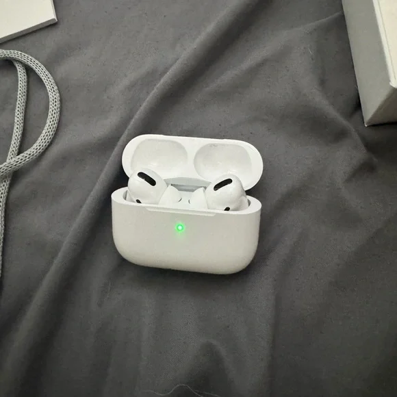 Apple AirPods Pro with White Shopping Bag